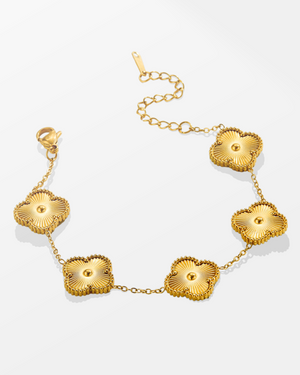 Pulsera de oro y trébol